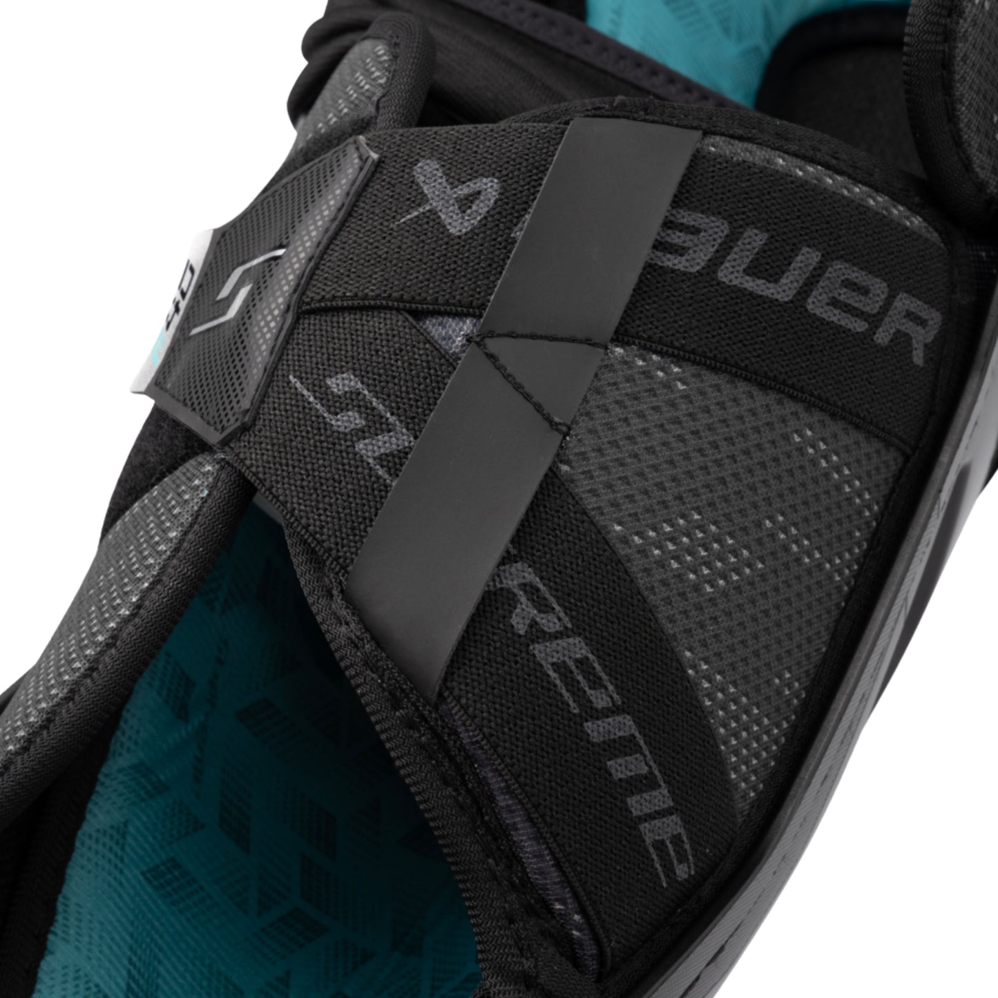 A photo of the Bauer Supreme F40 Senior Shin Guard in colour black and blue.
