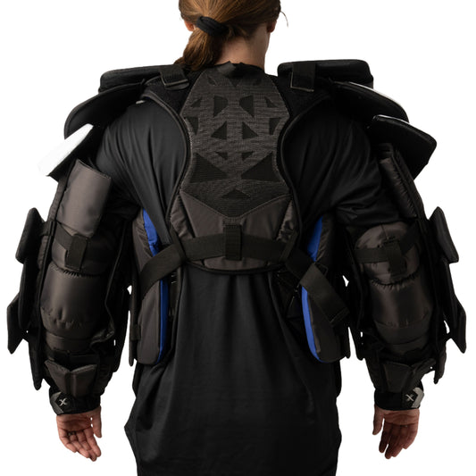 A photo of the Bauer Vapor Fly WMNS Senior Chest Protector in colour white, black and blue.