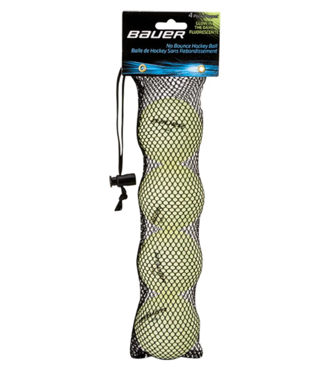 A photo of the Bauer Hockey Ball - Glow In The Dark 4 Pack in mesh bag.