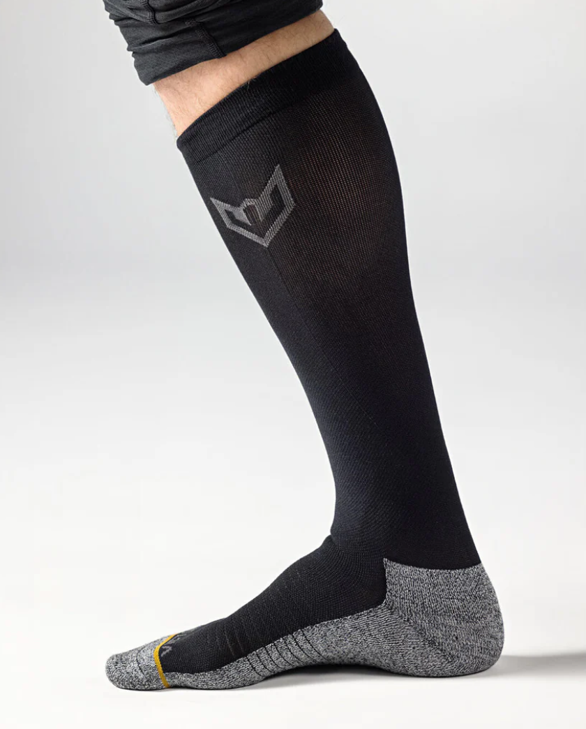 A photo of the Warroad Game Day Tech Hockey Socks in colour black.