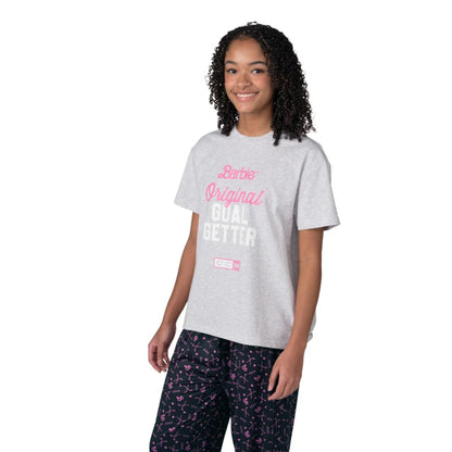 A woman wearing a grey Barbie™ x CCM Grey Goal Getter Short Sleeve T‑Shirt