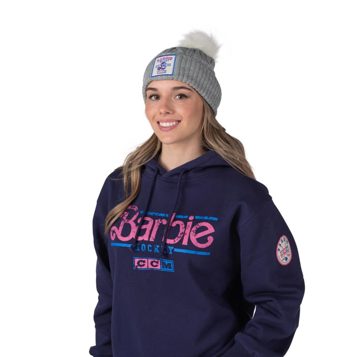 A photo of the Barbie™ x CCM Grey Pom Knit Adult Toque in colour grey.