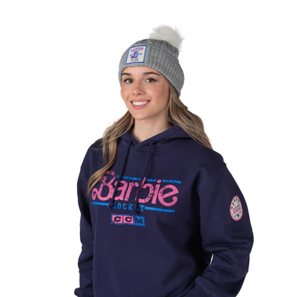 A photo of the Barbie™ x CCM Grey Pom Knit Adult Toque in colour grey.