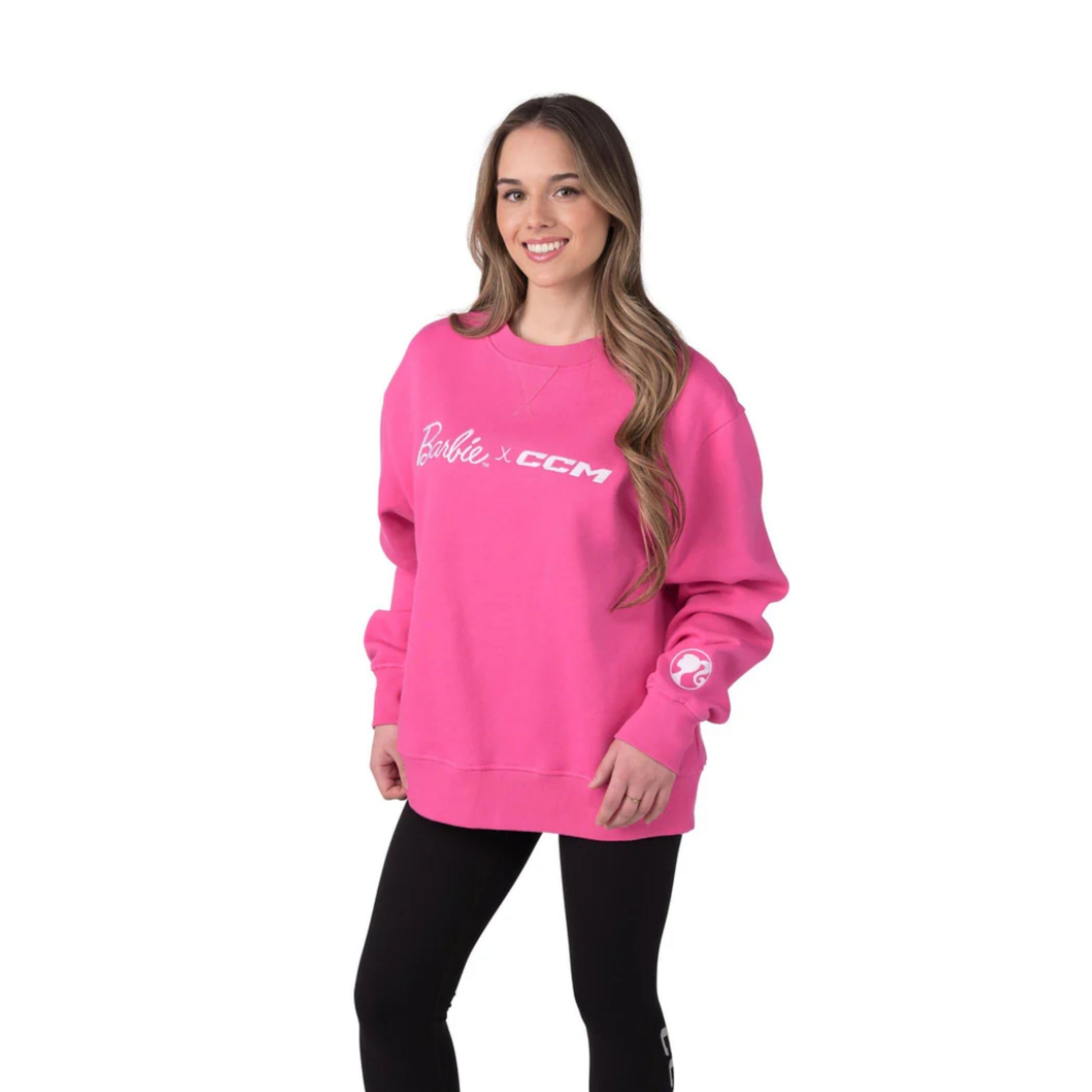 A photo of the Barbie™ x CCM Pink Embroidered Crewneck in colour pink.
