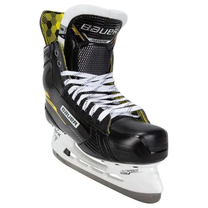 A photo of the Bauer Supreme M3 Senior Hockey Skates in colour black and yellow angled view.