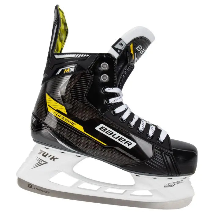 A photo of the Bauer Supreme M3 Senior Hockey Skates in colour black and yellow side view.