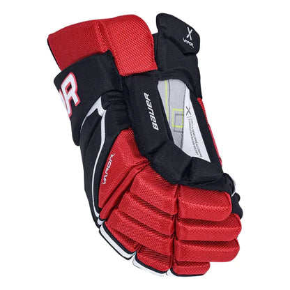 A photo of the Bauer Vapor Shift Pro Junior Hockey Gloves - Source Exclusive in colour black and red, side view.