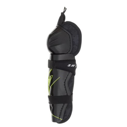 A photo of the Bauer Vapor Shift Pro Youth Shin Guard (2025) in colour black and green.