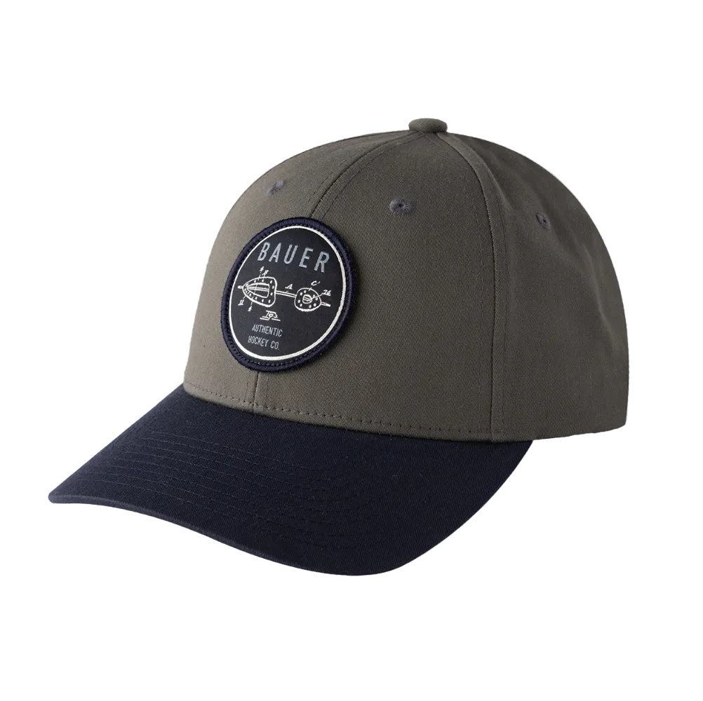 A photo of the Bauer Core Curved Brim 2 Tone Patch Senior Snapback Hat - Navy and grey