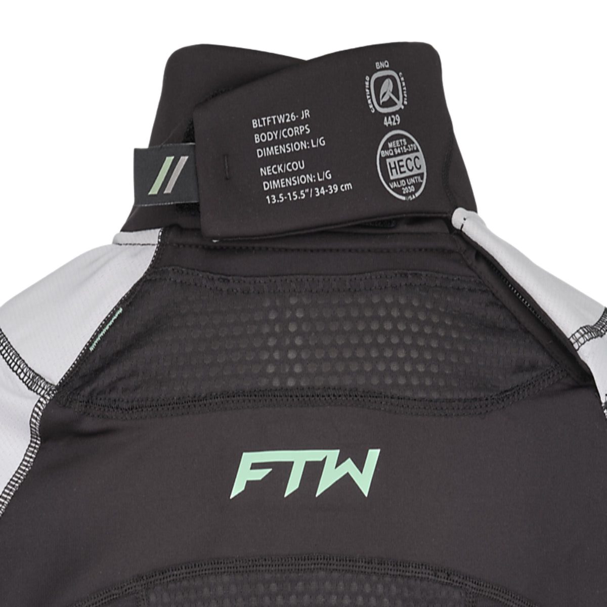 A photo of the CCM FTW Cut Protection Baselayer Long Sleeve Top Youth in colour black and white.