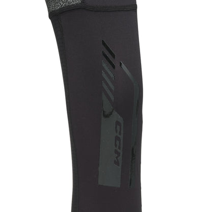 A photo of the CCM FTW Cut Protection Baselayer Pant with Jill Youth in colour black and grey.