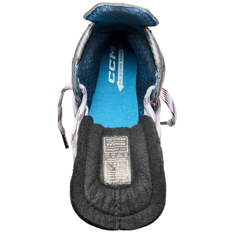 A photo of the CCM JetSpeed Control Youth Hockey Skates (2025) - Source Exclusive in colour black , red and grey.