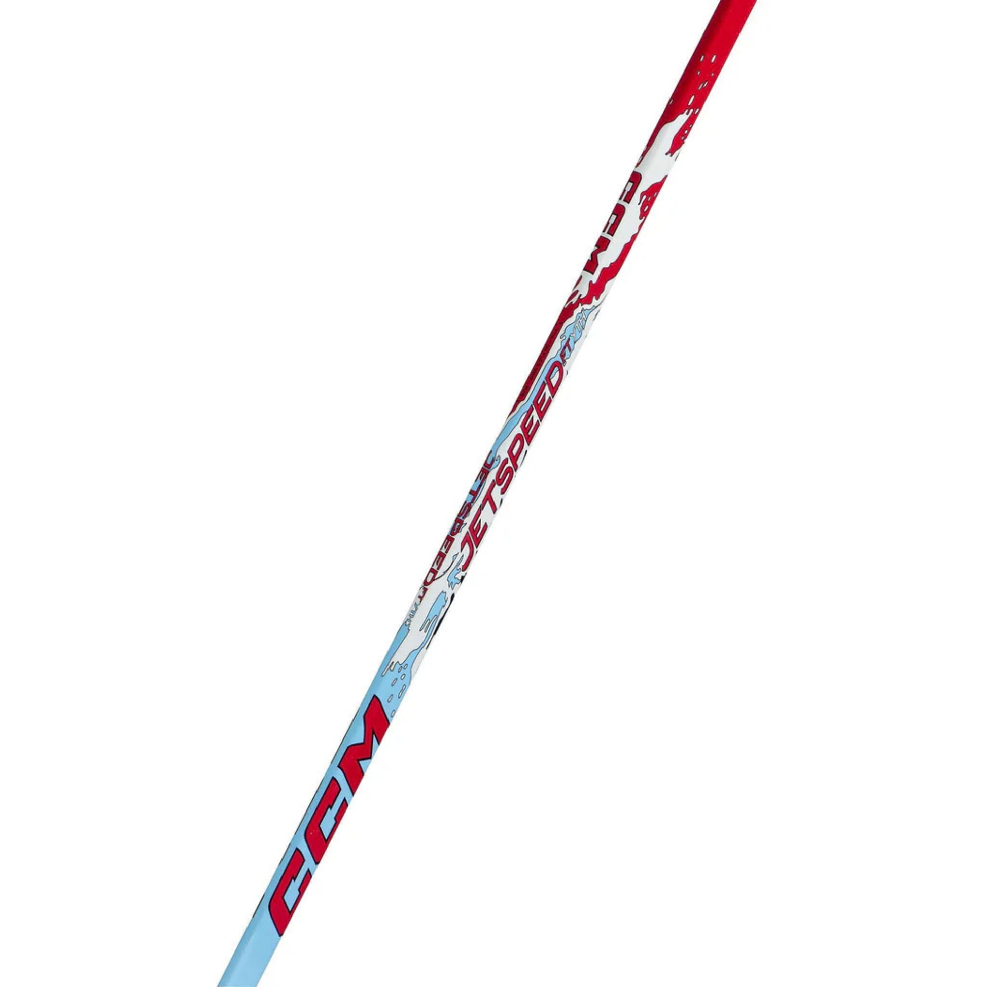 A photo of the CCM JetSpeed FT Youth Hockey Stick (2026) in color blue, white and red with red text.