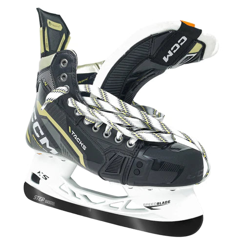 A photo of the CCM Tacks AS-V Pro Senior Hockey Skates 2022 edition with Step Blacksteel in colour black and yellow, open tongue view.