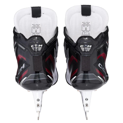 A photo of the CCM Tacks EFLEX 6.9 Junior Goalie Skates in colour black and red, rear view.