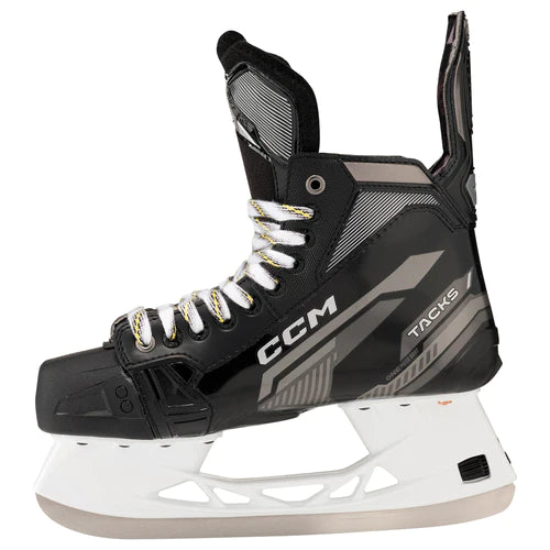 A photo of the CCM Tacks Vector Senior Hockey Skates - Source Exclusive (2022) in colour black side view.