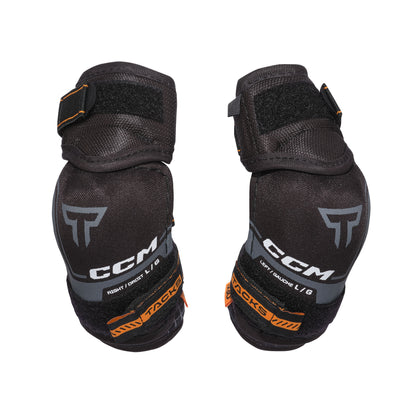 A photo of the CCM Tacks XR Pro Youth Hockey Elbow Pads in colour black and orange.