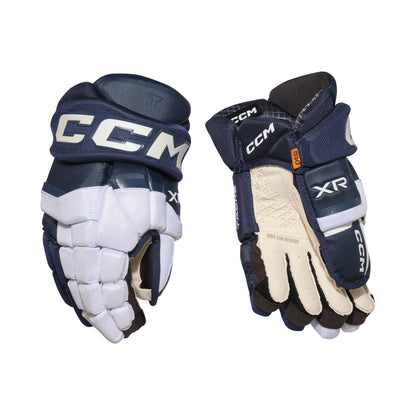 A photo of the CCM Tacks XR Pro Hockey Gloves in colour navy and white.