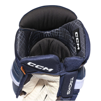 A photo of the CCM Tacks XR Pro Hockey Gloves in colour navy and white.