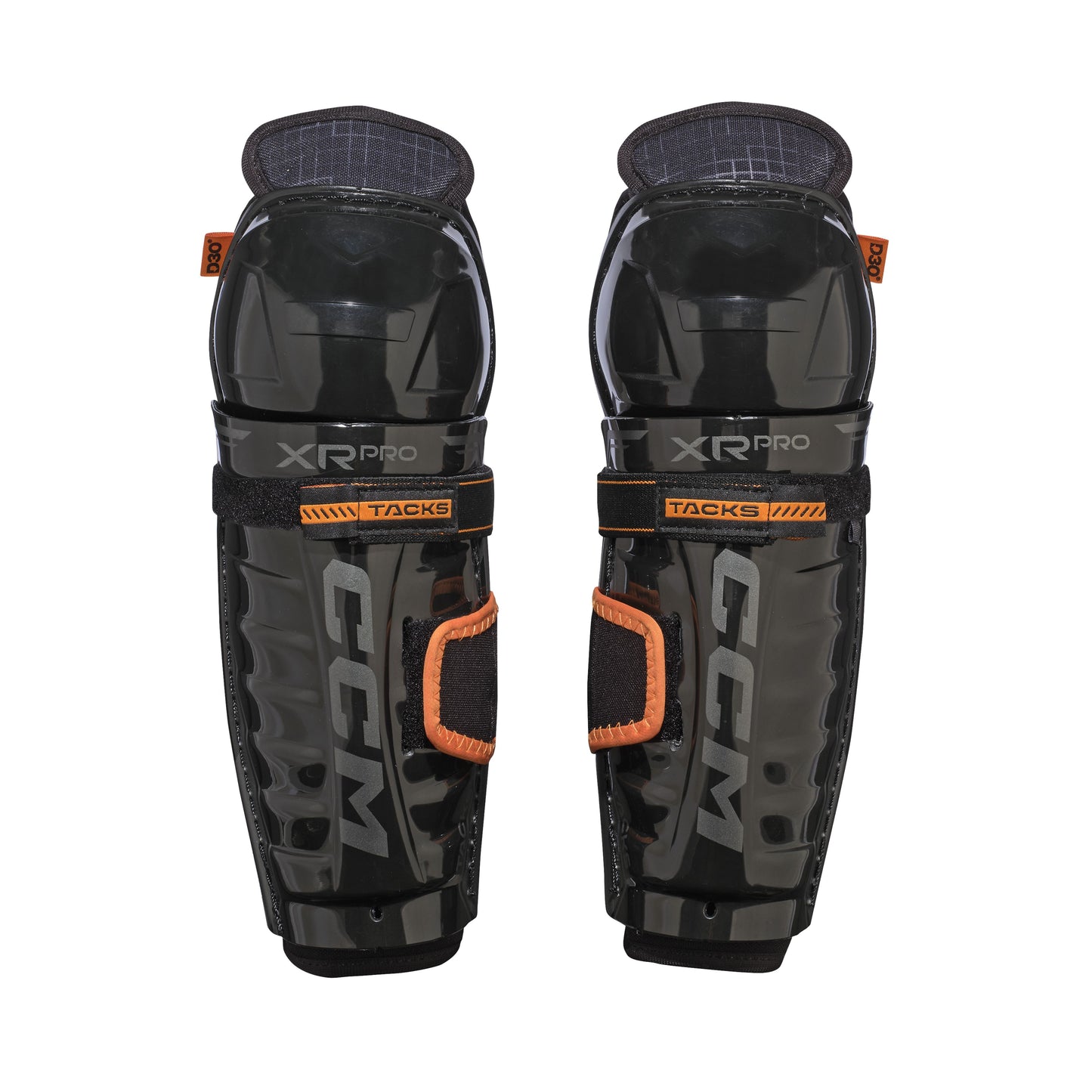 A photo of the CCM Tacks XR Pro Youth Hockey Shin Guards in colour black and orange.