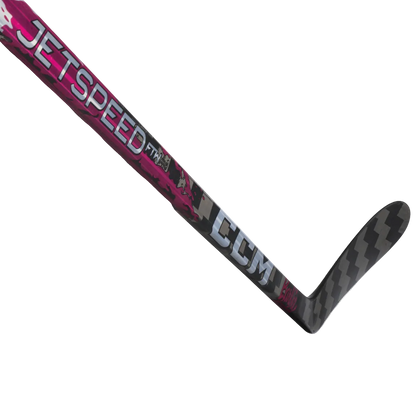 A photo of the CCM FTW X Barbie Base Senior Hockey Stick in colour red, white and black. 