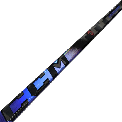 A photo of the CCM Ribcor Trigger 10 Pro Hockey Stick in colour black and purple.