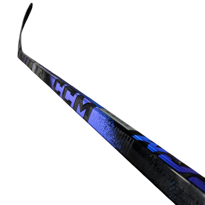 A photo of the CCM Ribcor Trigger 10 Pro Hockey Stick in colour black and purple.