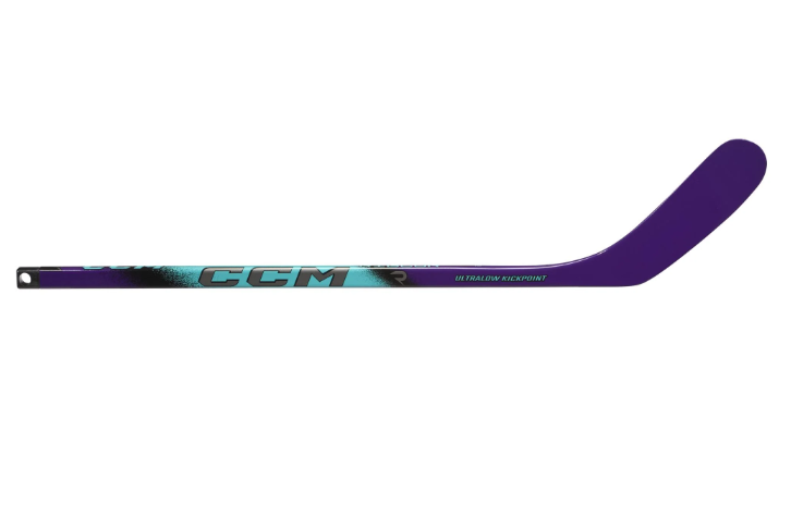 The CCM Ribcor Trigger 10 Pro Mini Hockey Stick in colour purple and teal.