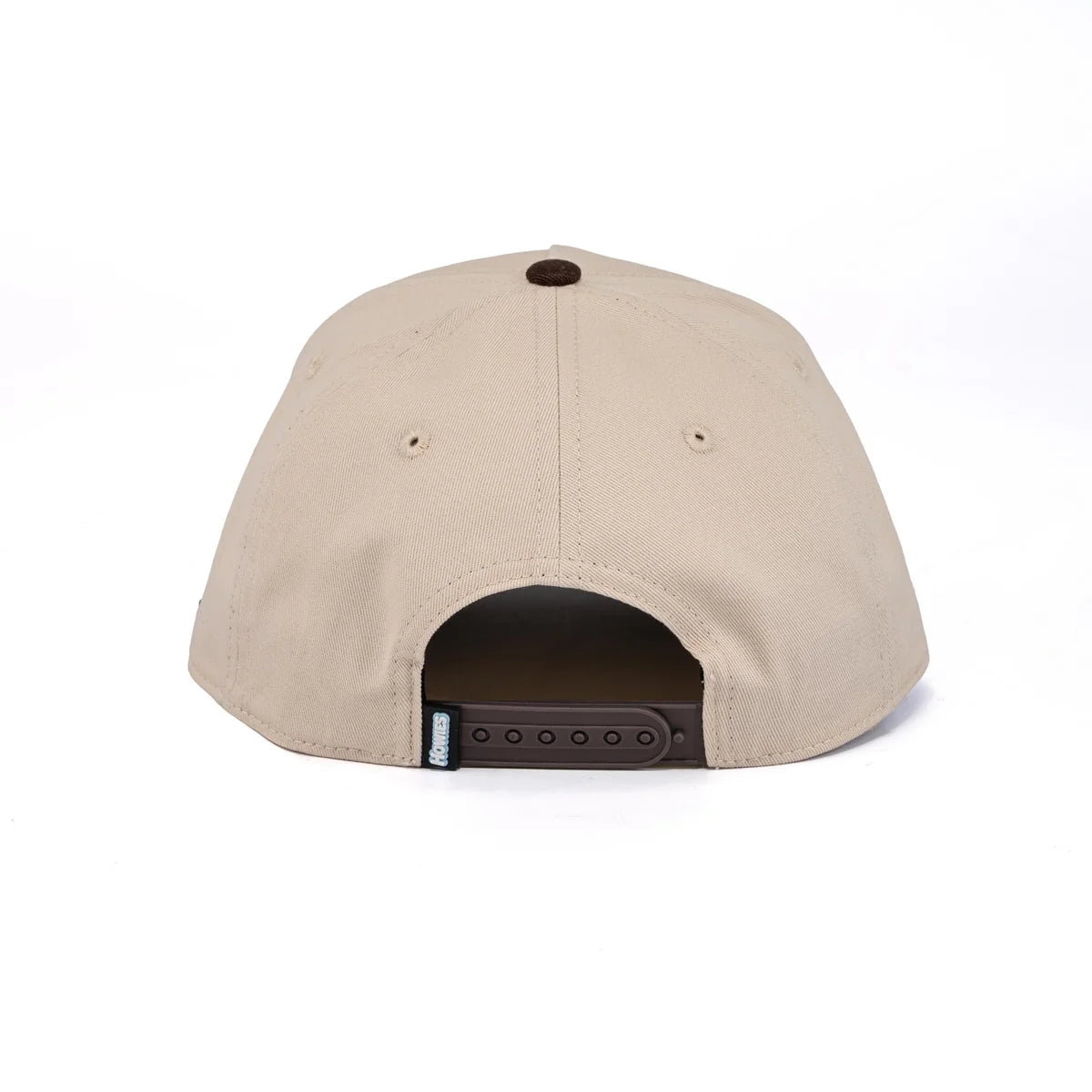 A photo of the Howies The Sharpshooter Lid in colour cream with a brown logo and a camo brim.