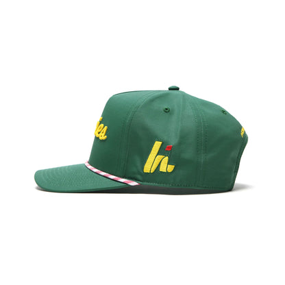 A photo of the Howies The Tour Lid - The Masters in colour green and yellow.