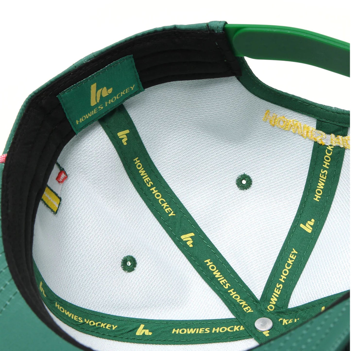 A photo of the Howies The Tour Lid - The Masters in colour green and yellow.