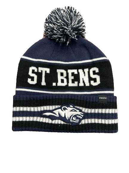 A photo of the St. Benedict Sublimated Toque with St. Bens writing and BEARS logo, in colour blue, black, and white. Pom Pom Ball on top.