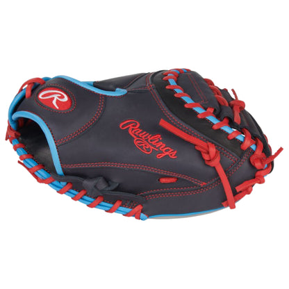 A photo of the Rawlings NXT Series 32.5" Catcher's Mitt in colour black, with blue trim and red lace.