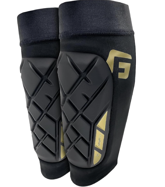 A photo of the G-Form Pro-S Elite X Soccer Shin Guard in colour black with gold accents.