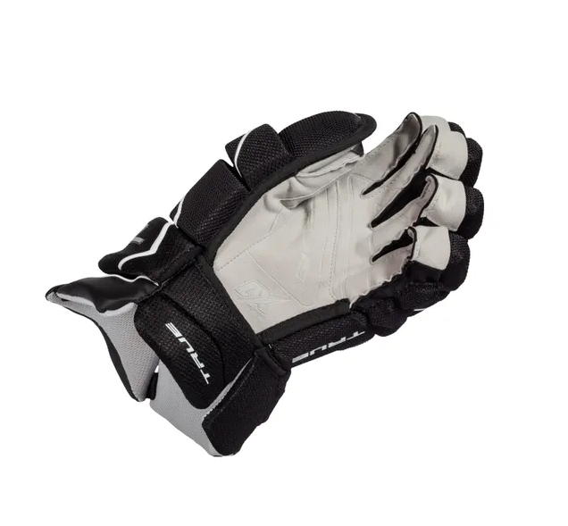 A photo of the True Catalyst 9X Hockey Glove in colour black. Side view.