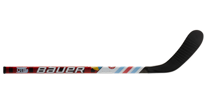 A photo of the Bauer Mystery Mini Stick 2024 On The Bench Jacob hockey stick in colour red. 