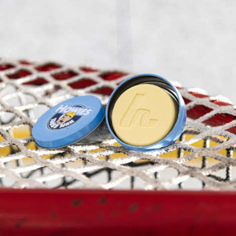 A photo of the Howies Hockey Tacky Wax single open light blue can.