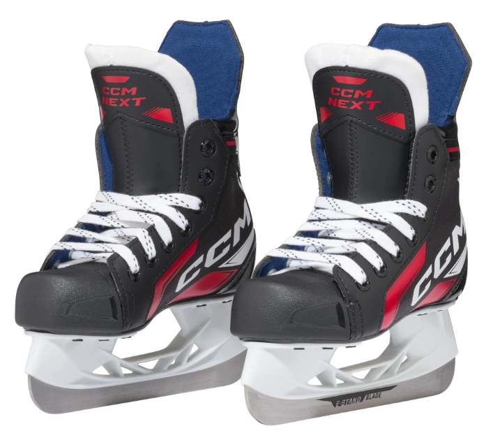 A photo of the CCM Next Youth Hockey Skates (2024) in colour black and red. Dual skate angled front view.