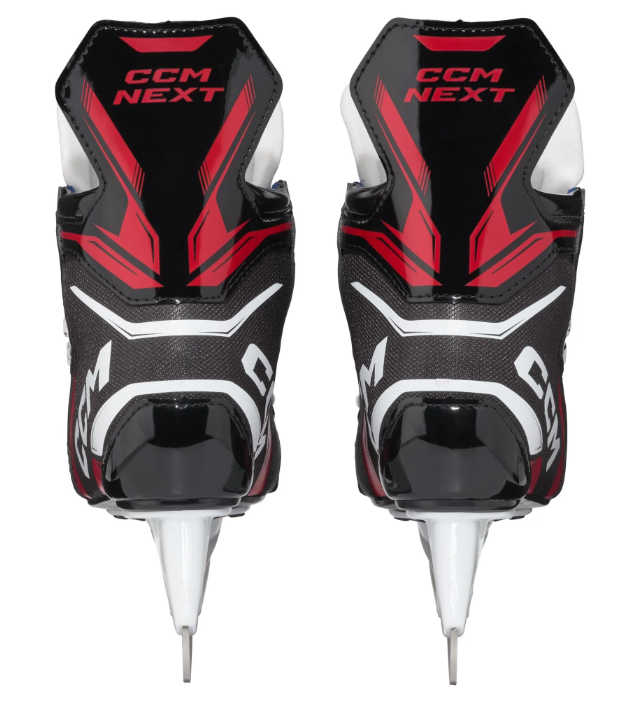 A photo of the CCM Next Youth Hockey Skates (2024) in colour black and red. Dual skate rear view.