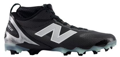 A photo of the New Balance Men's FreezeLX V5 Mid Lacrosse Cleats in colour black and white. Side view.