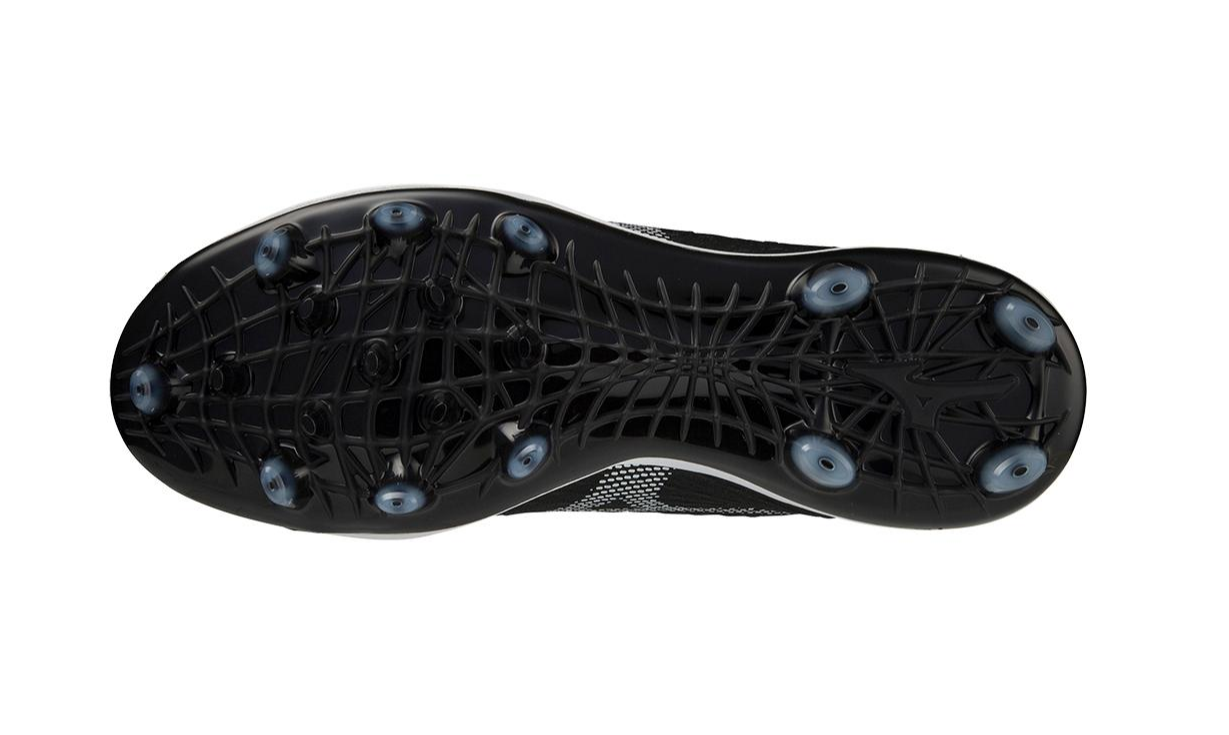 A photo of the Mizuno Dominant 4 TPU Men's Molded Baseball Cleat in colour black and white. Bottom sole profile.