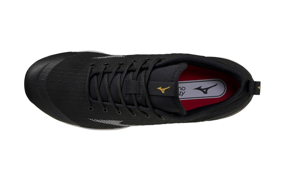 A photo of the Mizuno Dominant 4 TPU Men's Molded Baseball Cleat in colour black and white. Top down profile.