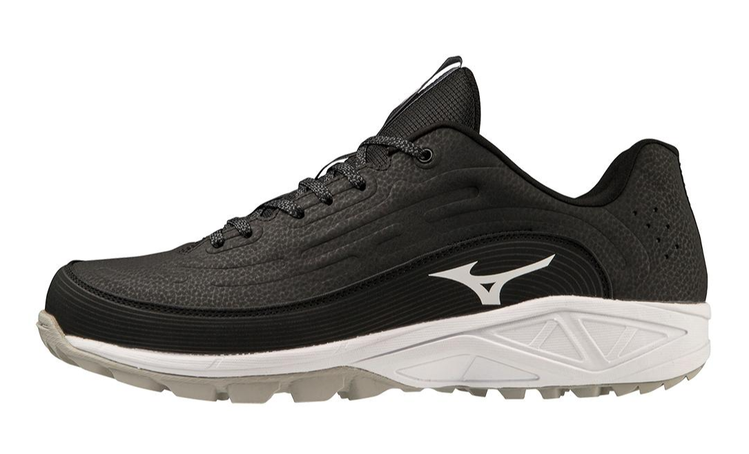 A photo of the Mizuno Ambition 3 BB Low All Surface in colour black and white. Side profile.