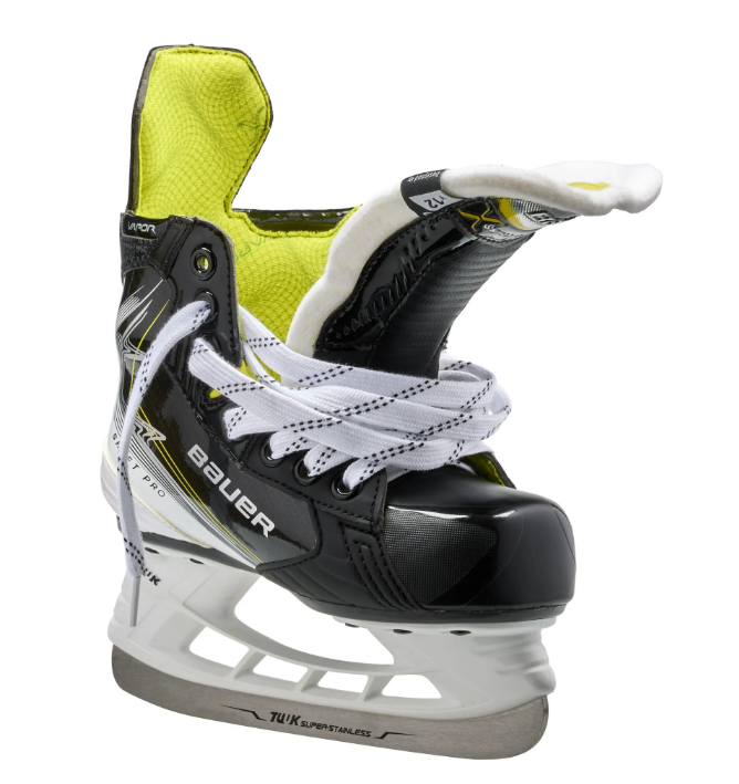 A photo of the Bauer Vapor Shift Pro Youth Hockey Skates (2025) in colour black, white and green.
