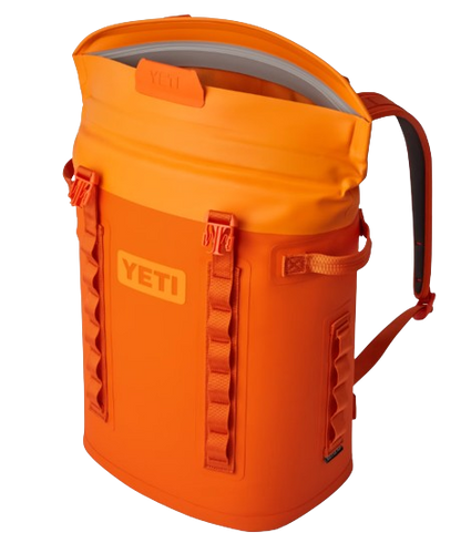 A photo of the Yeti Hopper M20 Backpack Soft Cooler side, open view in king crab orange