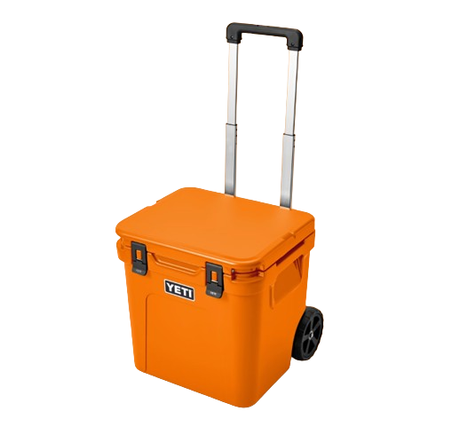 A photo of the Yeti Roadie 48 Wheeled Cooler in colour king crab orange, front, closed-lid view.