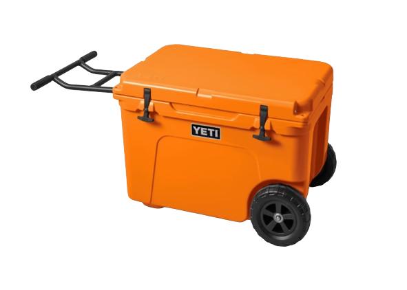 A photo of the Yeti Tundra Haul Wheeled Cooler in colour king crab orange, front, closed view. Extended handle bars.