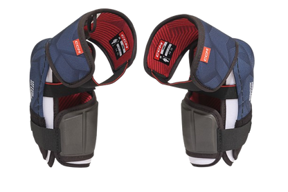 A photo of the CCM Next Elbow Pads in colour navy and black. Rear view.