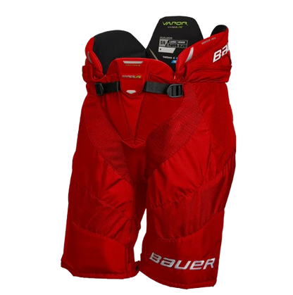 A photo of the Bauer Vapor Hyperlite Hockey Pants in colour red. Front view.