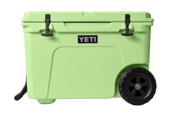 A photo of the Yeti Tundra Haul Wheeled Cooler in colour key lime green, front, closed view.